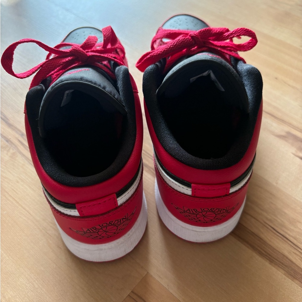 Jordan 1 Low Top Red and Black Sneakers